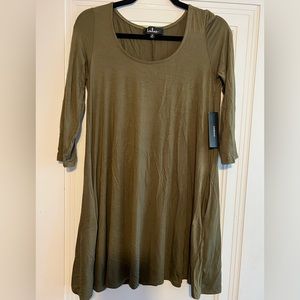 Lulus dress! Never worn! Has pockets!